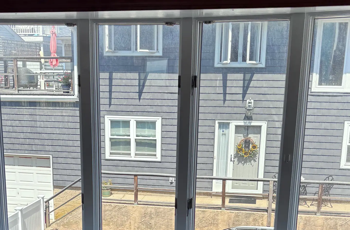A wall of new windows in an empty room