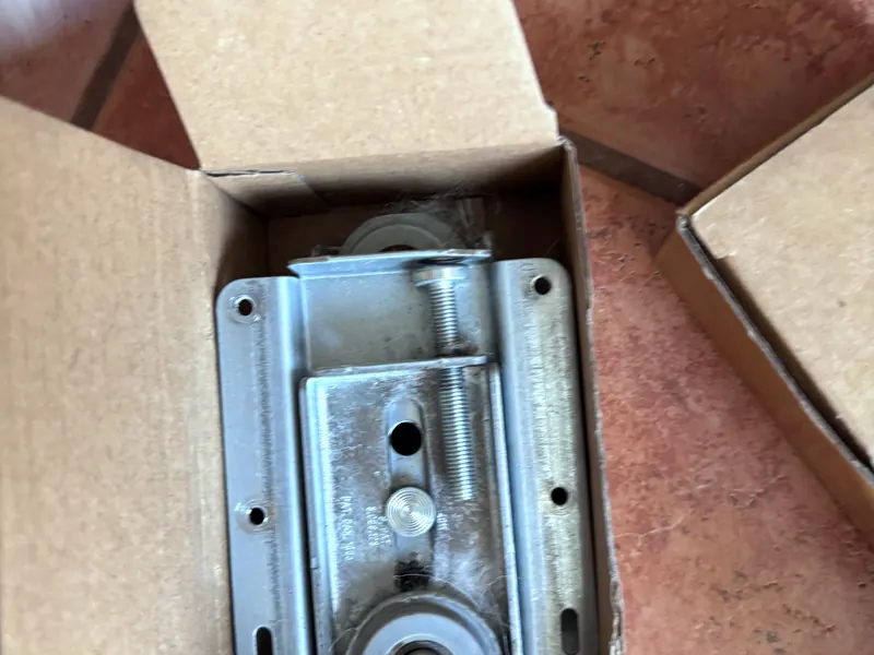 A new patio door roller in its box
