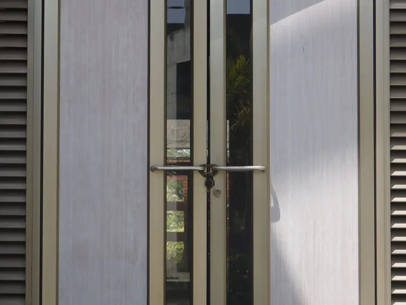 Aluminum framed double doors with lever handles